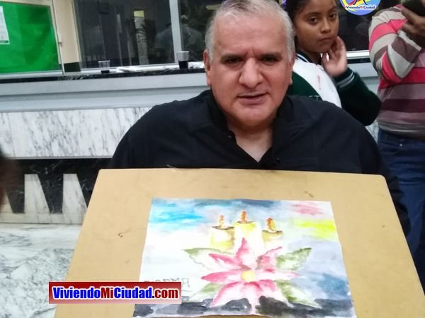 Joel Ramos en el Dia Munidal Pintor Boca y Pie